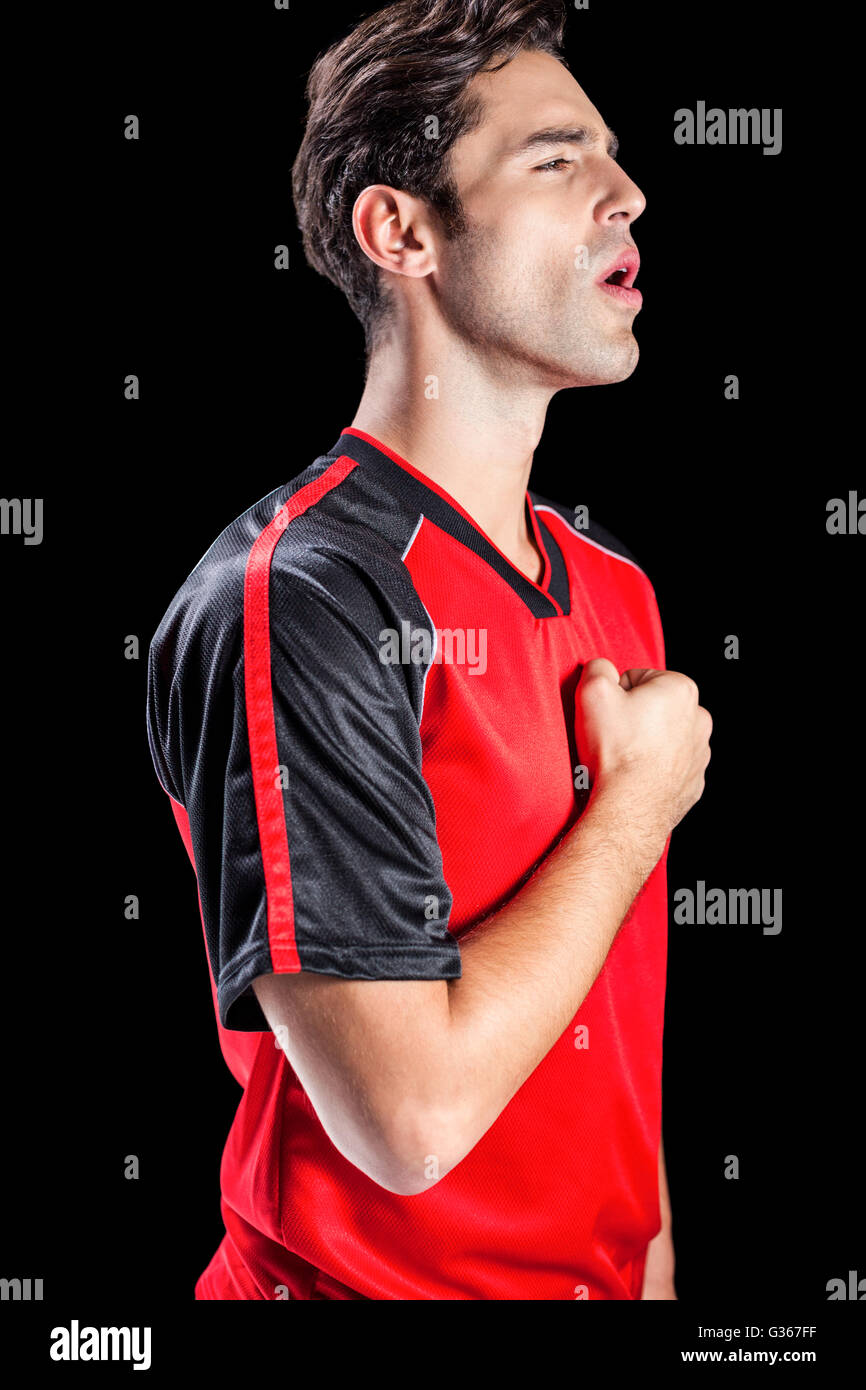 Faire preuve de respect de l'athlète pendant l'hymne national Banque D'Images