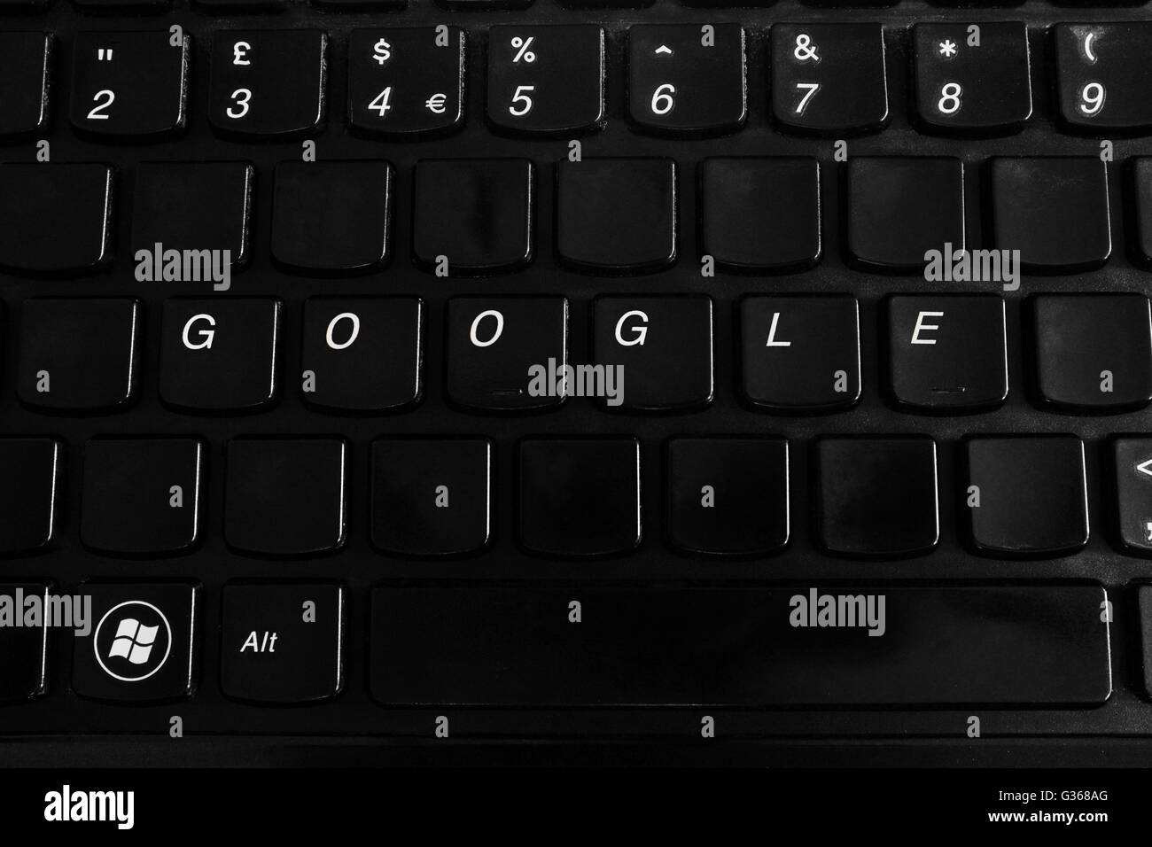 Un clavier d'ordinateur portable noir avec Google sur elle. Banque D'Images
