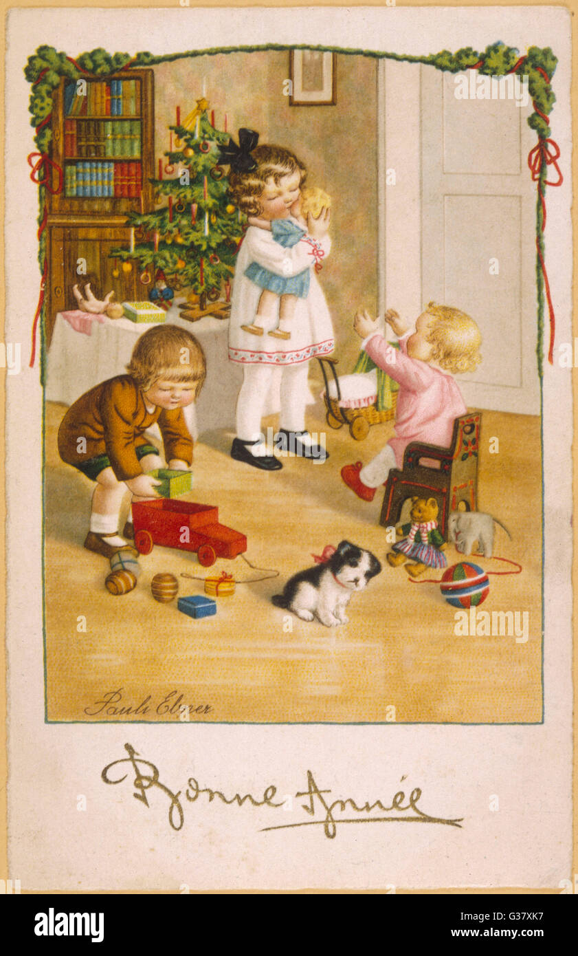 Enfants jouant avec des cadeaux de Noël, 1935. Banque D'Images