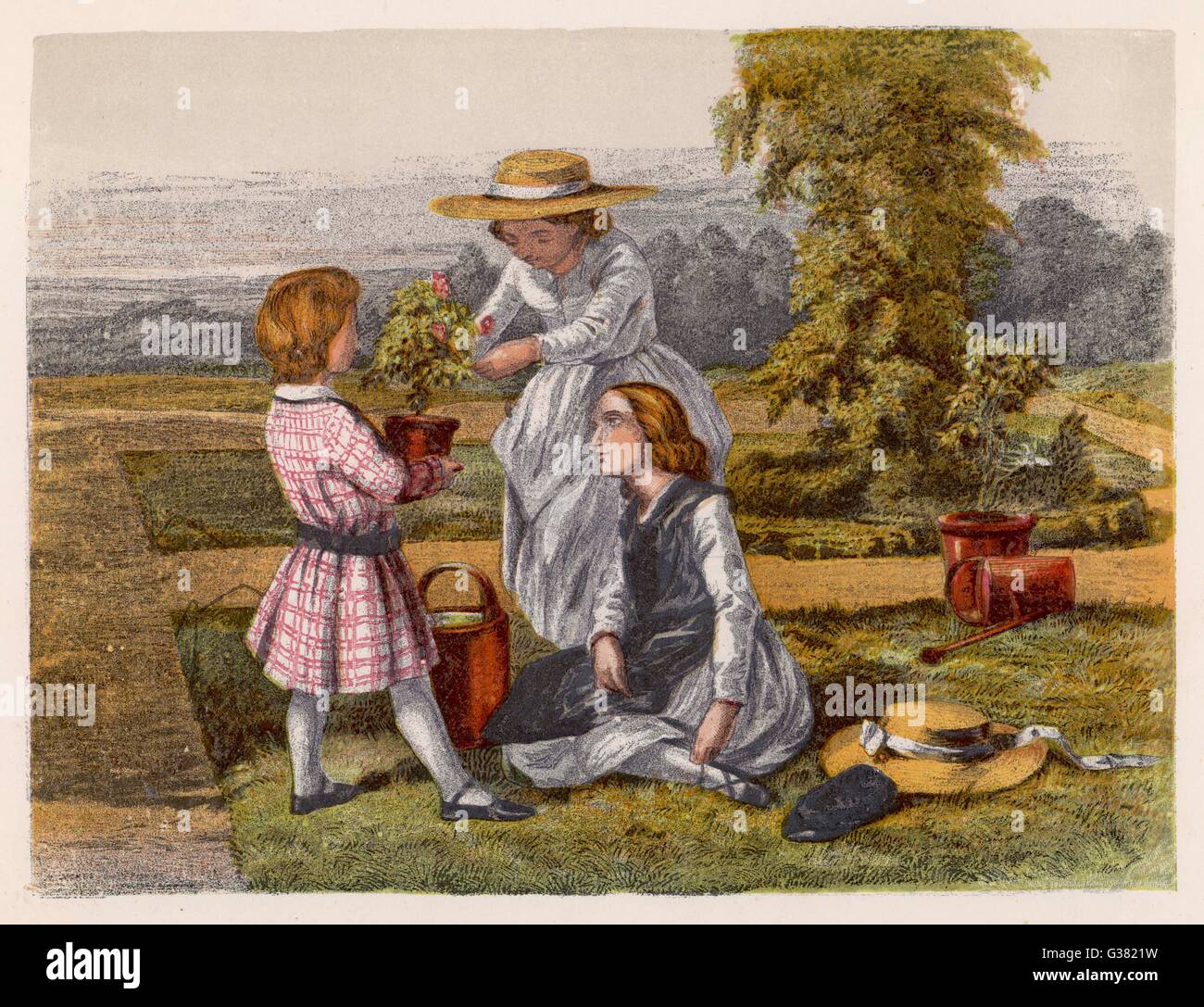 LES ENFANTS PLANTENT UNE ROSE Banque D'Images