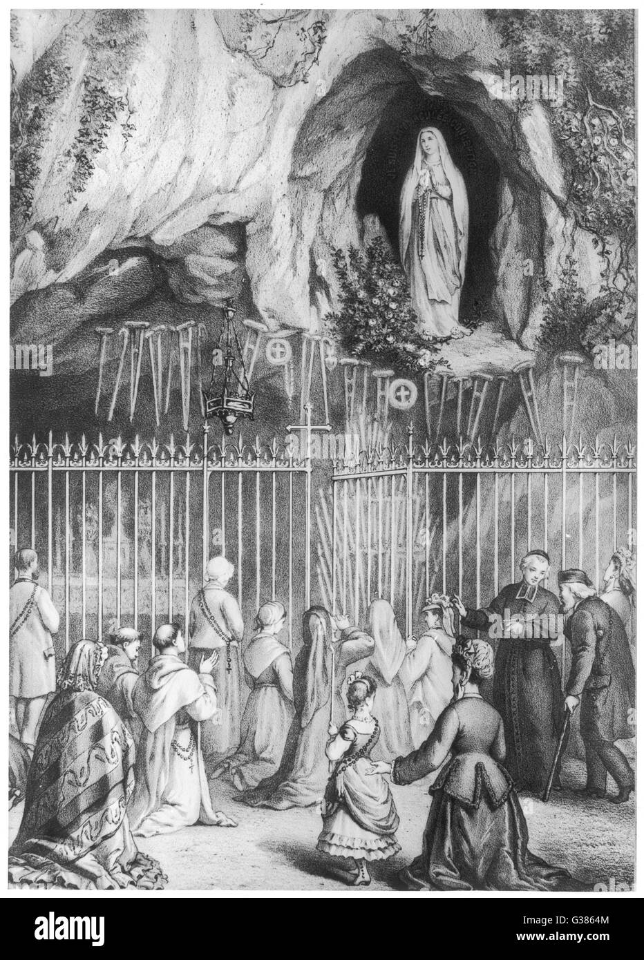 PÈLERINS À LA GROTTE Banque D'Images