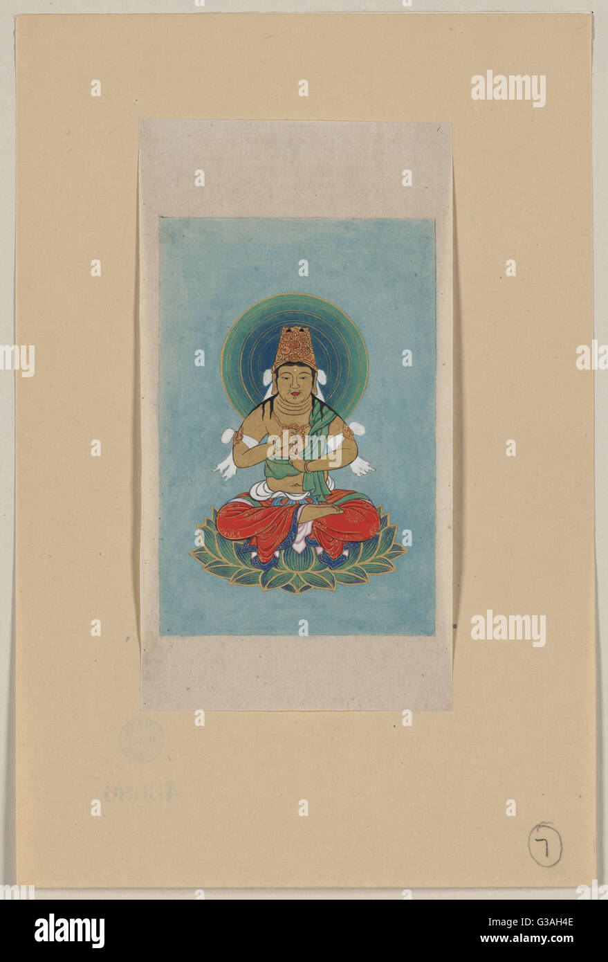 Figure religieuse assise sur un lotus, face à l'avant, avec du bleu Banque D'Images