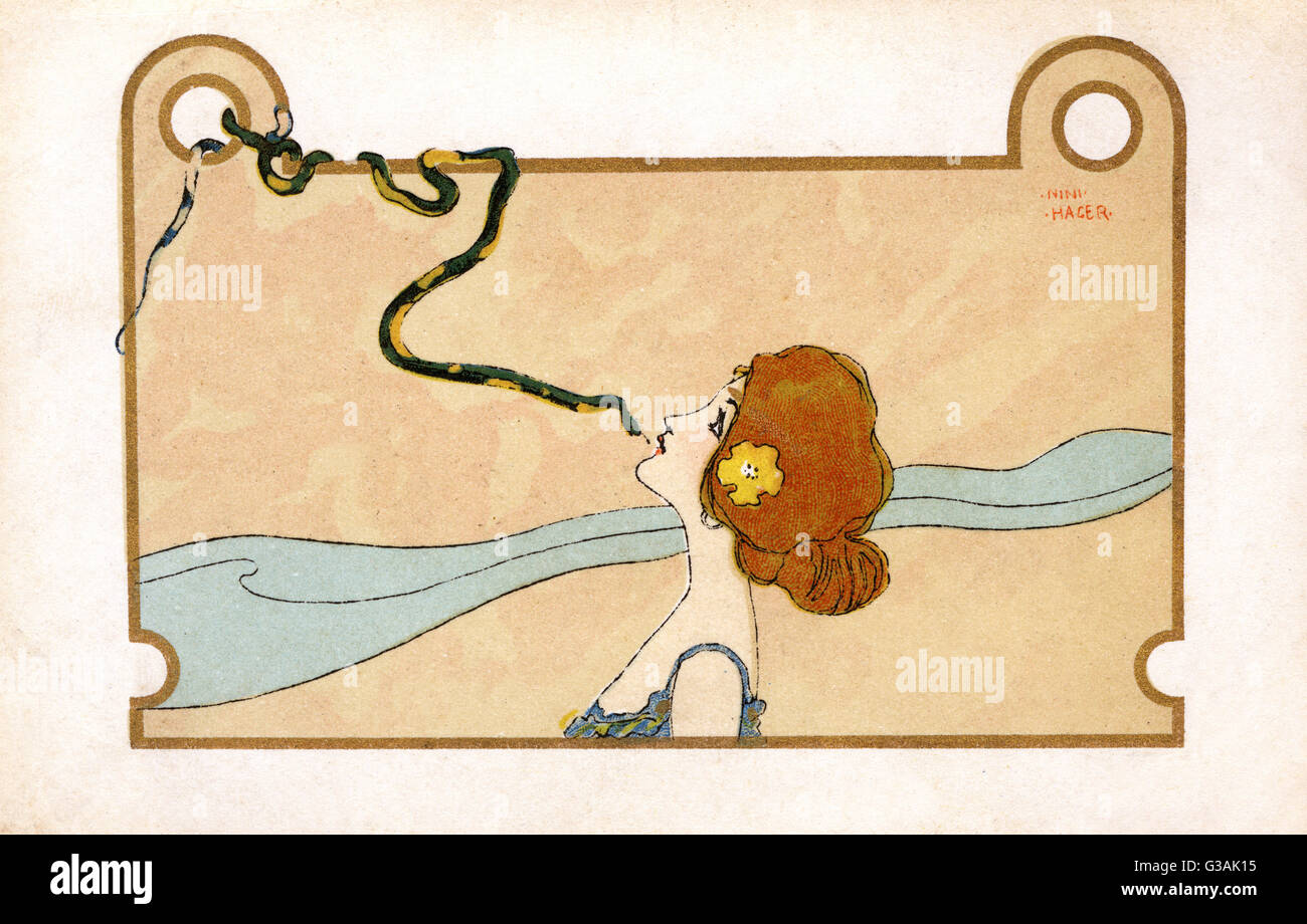 Art nouveau - jolie fille embrasse un serpent vert Banque D'Images
