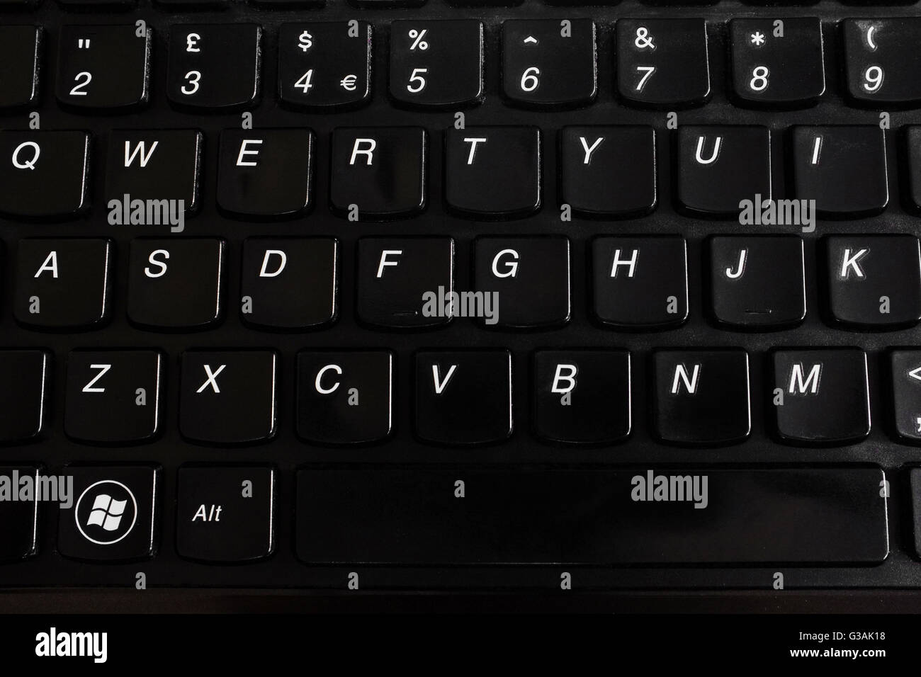 Un clavier QWERTY Clavier noir d'un ordinateur portable Lenovo Photo Stock  - Alamy