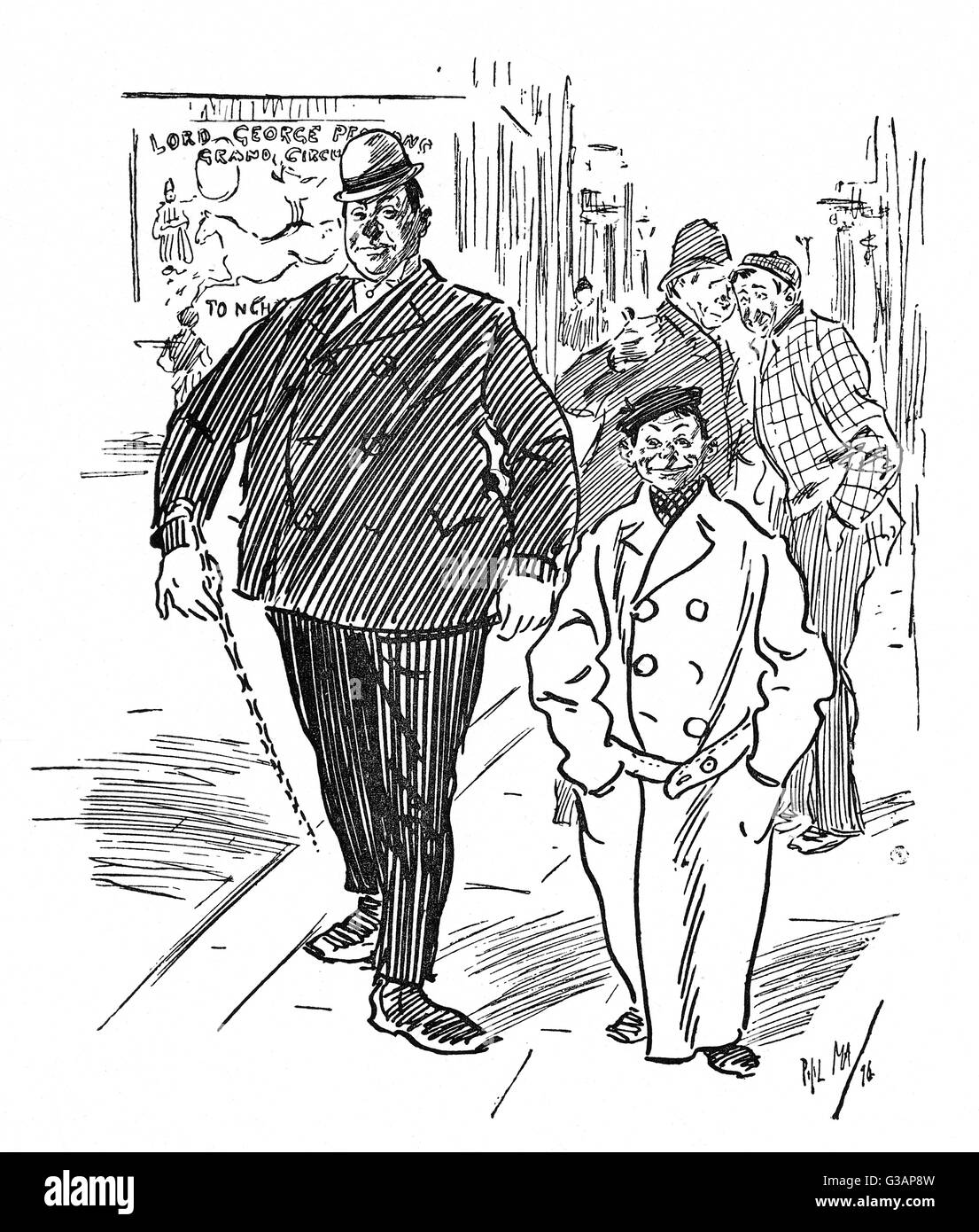 Deux clowns hors travail attirent l'attention dans une ville de garnison Banque D'Images