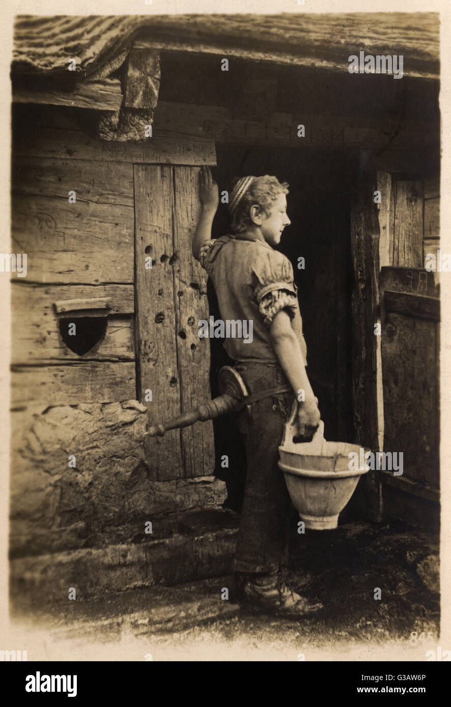 Milking Boy - Grindelwald, Suisse Banque D'Images