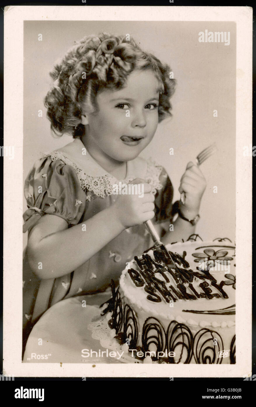 Shirley Temple 1928 14 L Enfant Americain Star Des Annees 1930 De Savourer Son Gateau D Anniversaire Date 1930 Photo Stock Alamy