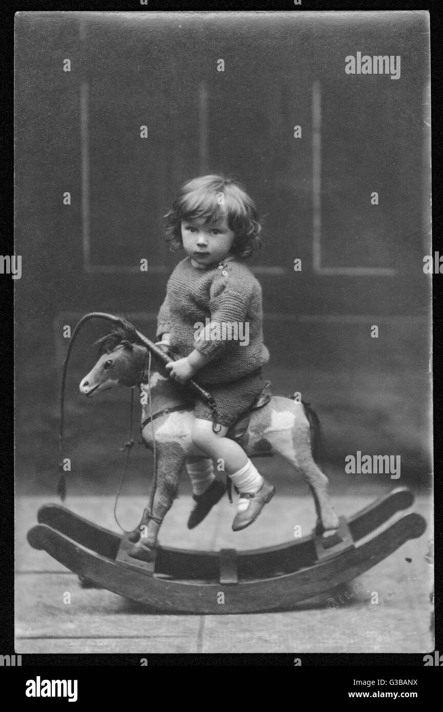 Garçon en tenue tricotée Banque D'Images