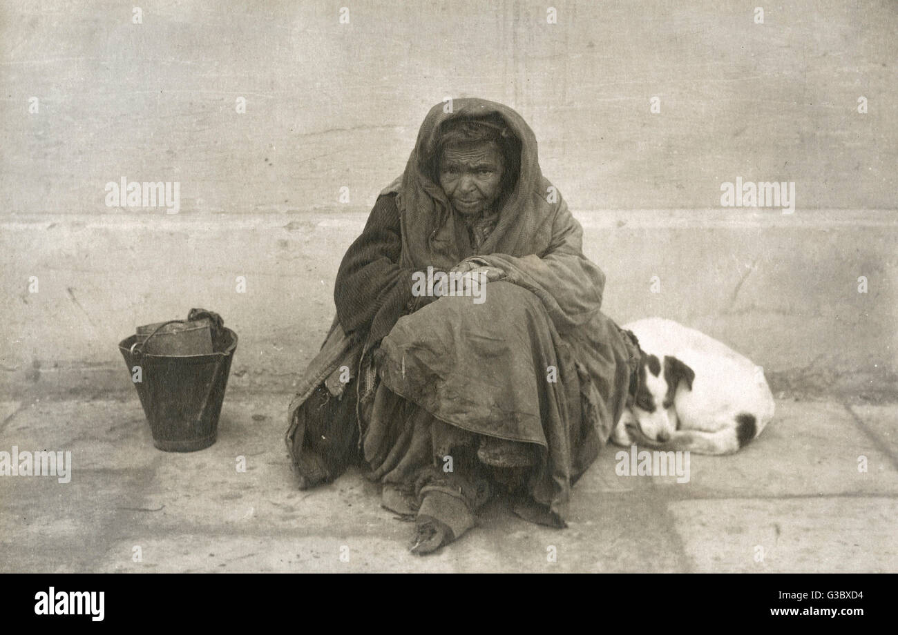 Pauvre mendiant macédonien et son chien Banque D'Images