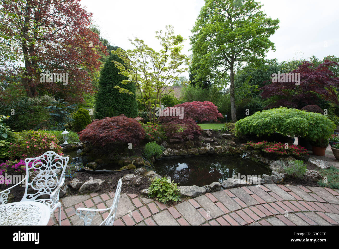 Jardin avec coin salon extérieur Banque D'Images