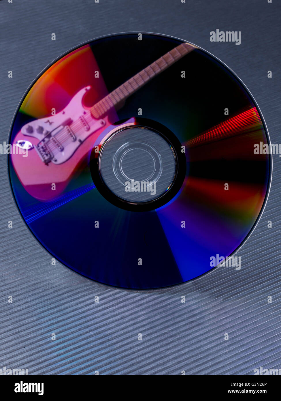 Guitare électrique dans un disque compact Banque D'Images