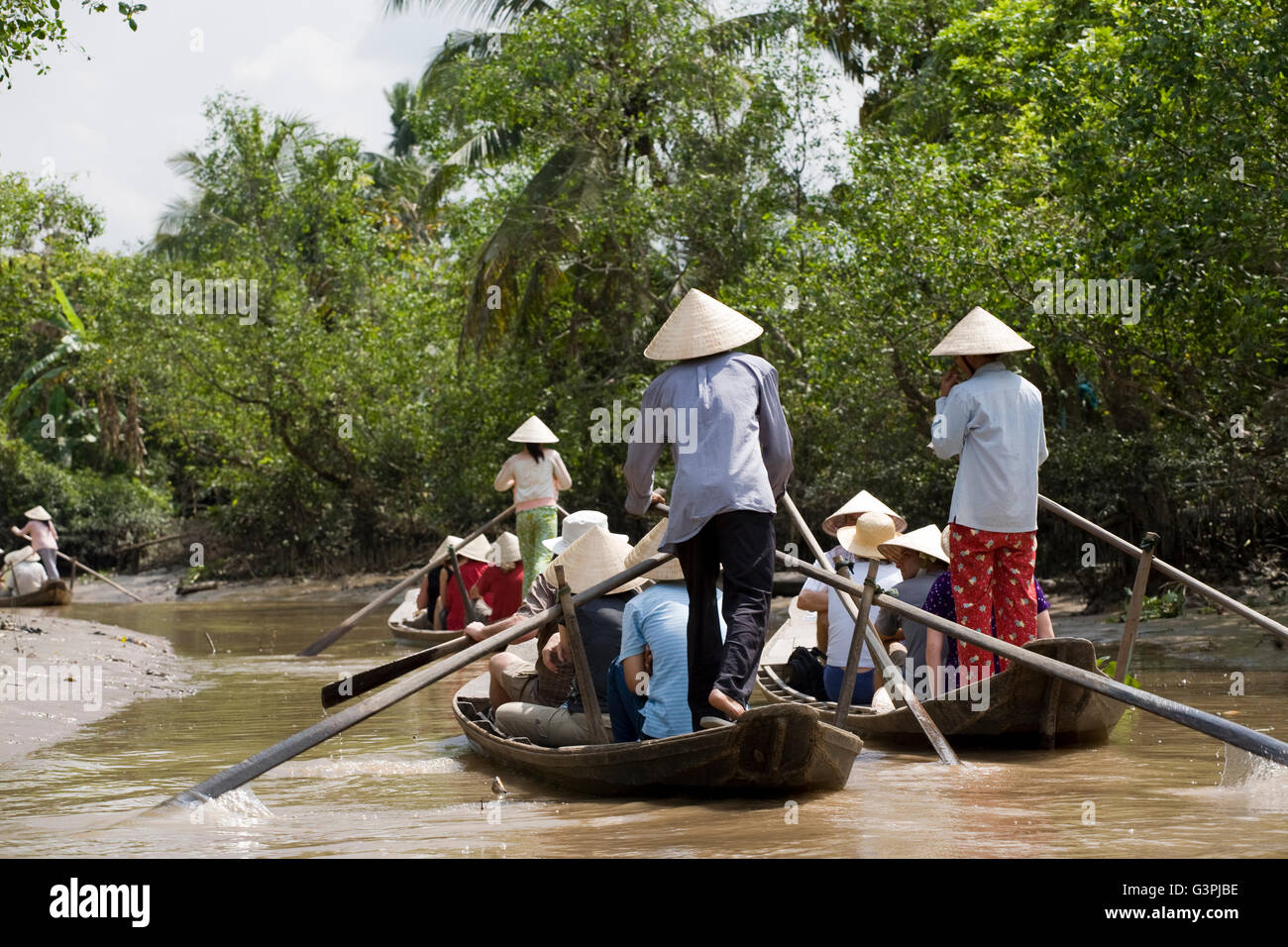 Le transport par bateau traditionnel, Delta du Mékong, au Sud Vietnam, Vietnam, Asie du Sud, Asie Banque D'Images Le transport par bateau traditionnel, Delta du Mékong, au Sud Vietnam, Vietnam, Asie du Sud, Asie Banque D'Images
