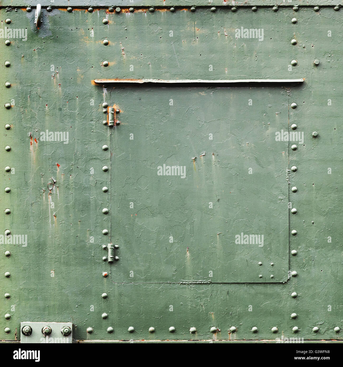 Square abstract green metal texture de fond avec des boulons et des rivets Banque D'Images