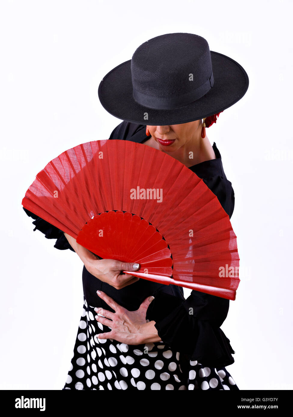 Homme, robe de flamenco avec un ventilateur, sur fond blanc Banque D'Images