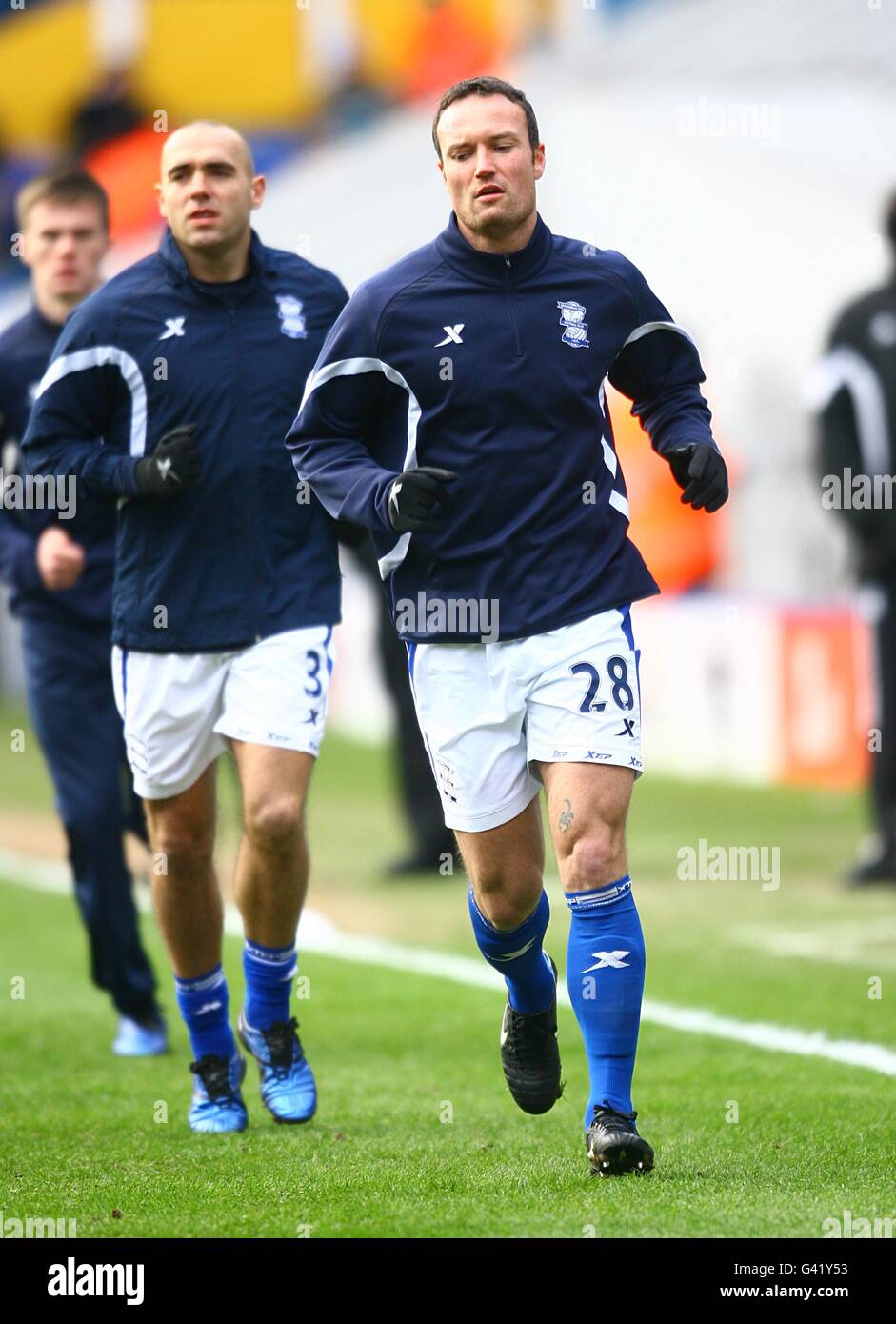 Martin Jiranek de Birmingham City (à droite) se réchauffe avant le match Banque D'Images