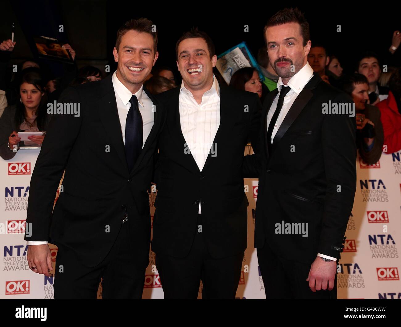 (De gauche à droite) Ashley Taylor Dawson, Jamie Lomas et Emmett J. Scanlan arrivent pour les National Television Awards 2011 à l'O2 Arena, Londres. Banque D'Images