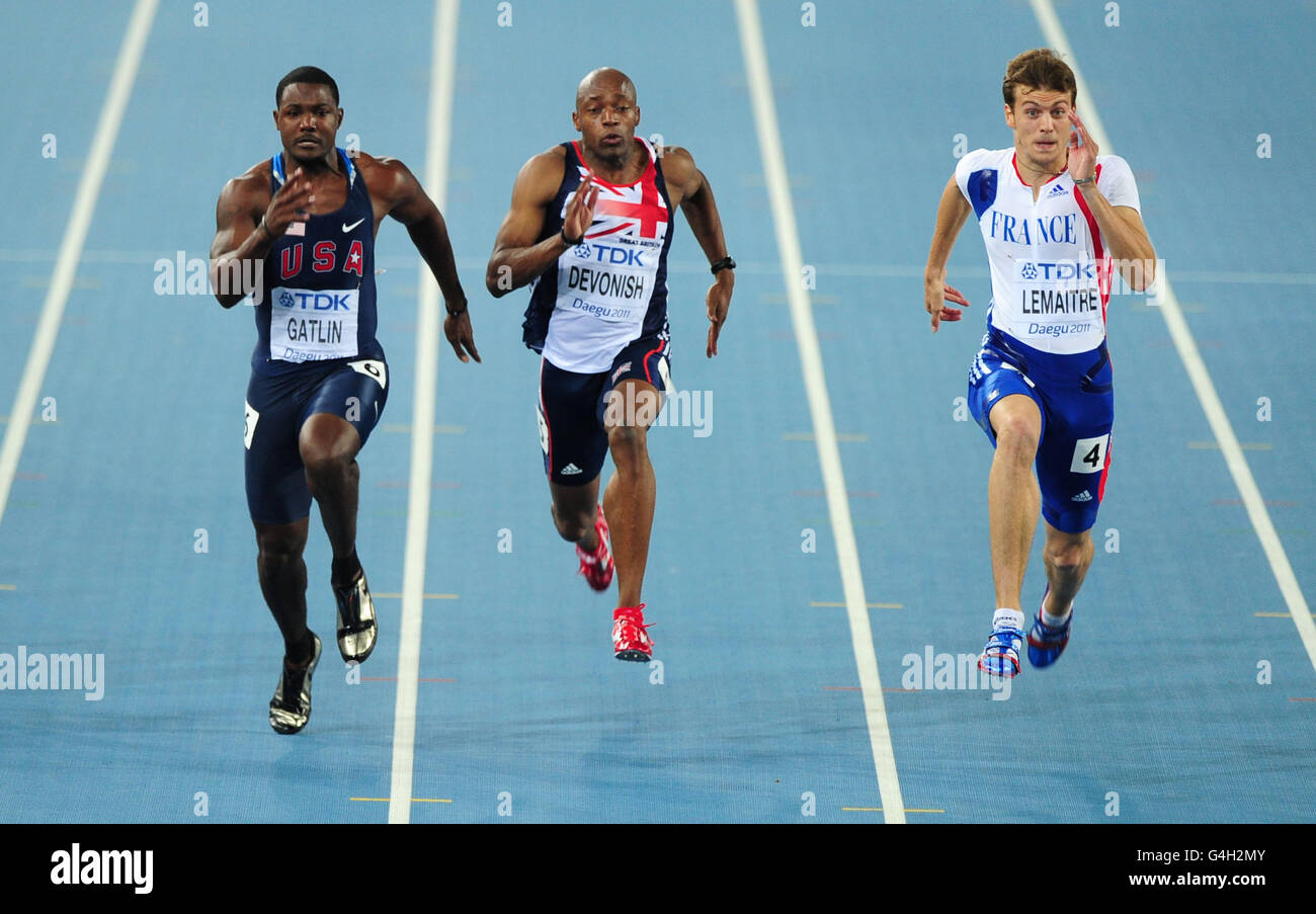 Marlon Devonish (c) de Grande-Bretagne pendant sa chaleur de 100m avec Justin Gatlin (l) des États-Unis et Christophe Lemaitre de France Banque D'Images