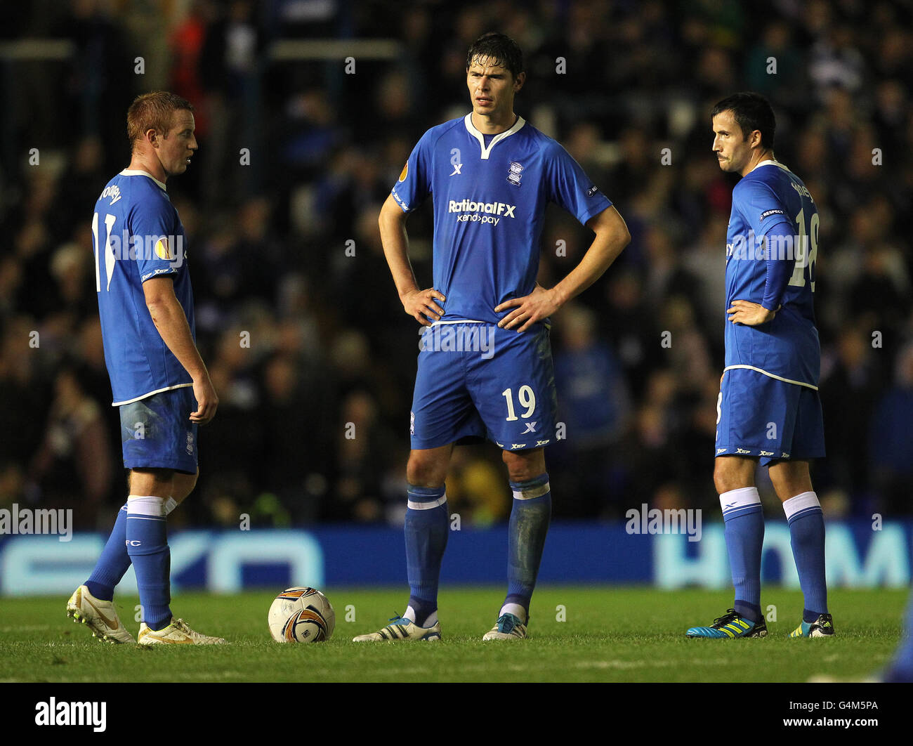Les joueurs de Birmingham City Adam Rooney, Nikola Zigic et Keith Fahey (de gauche à droite) sont découragés après avoir concédé leur deuxième but Banque D'Images