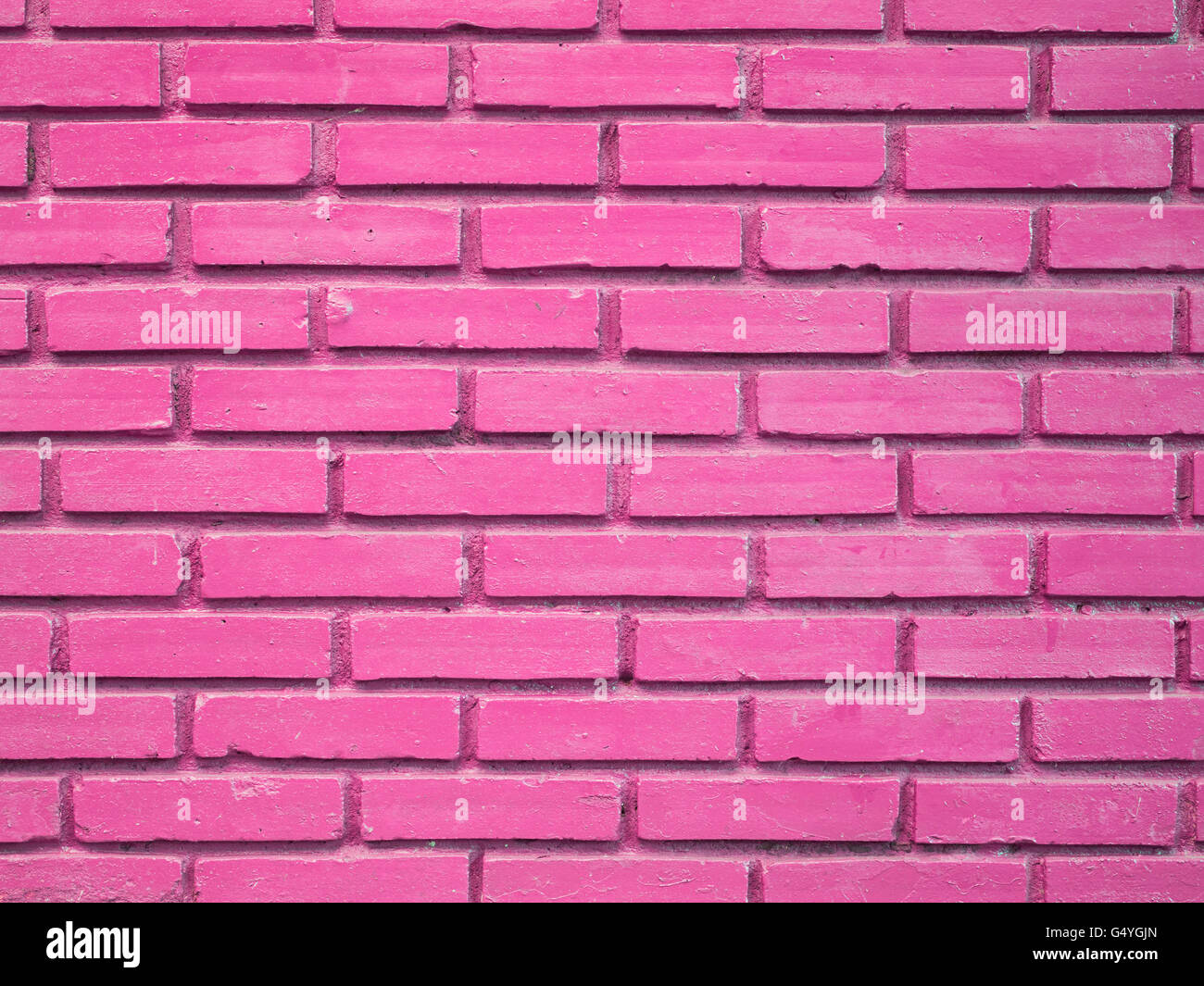 Mur de brique rose texture background Banque D'Images