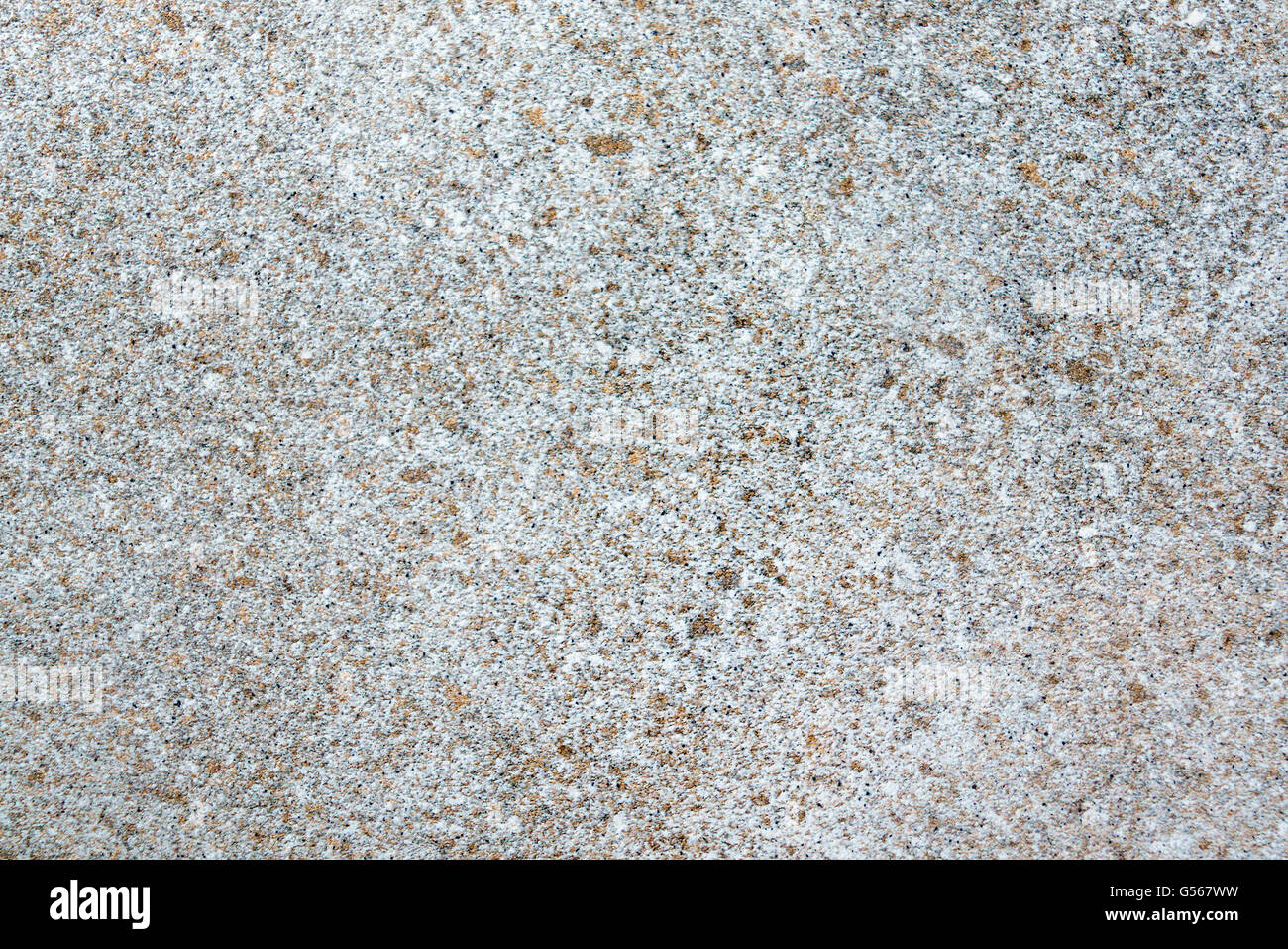 Surface de la paroi de l'gris béton granit avec taches jaunes. Banque D'Images
