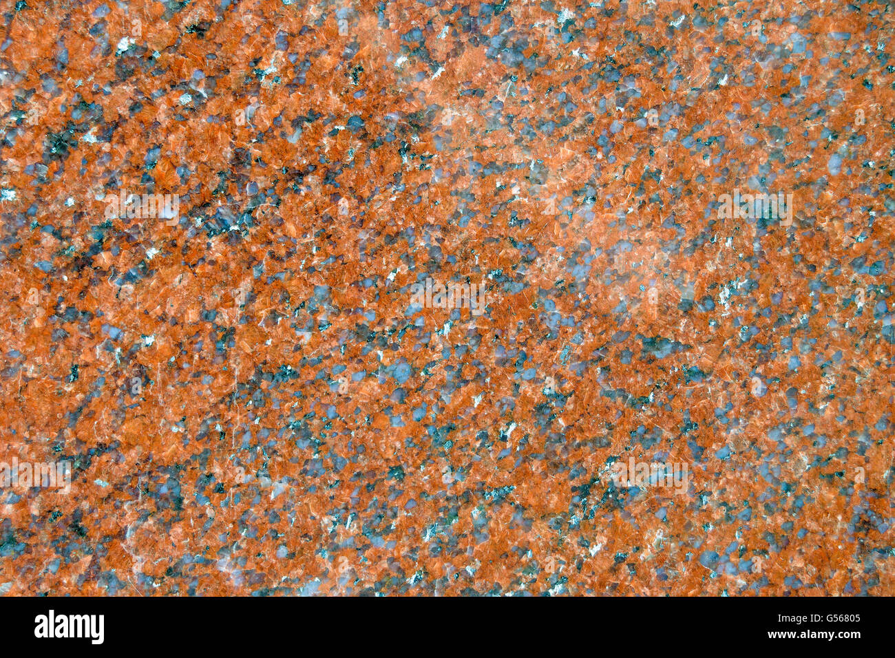 Surface du mur de granit noir, gris et marron avec des taches blanches. Banque D'Images