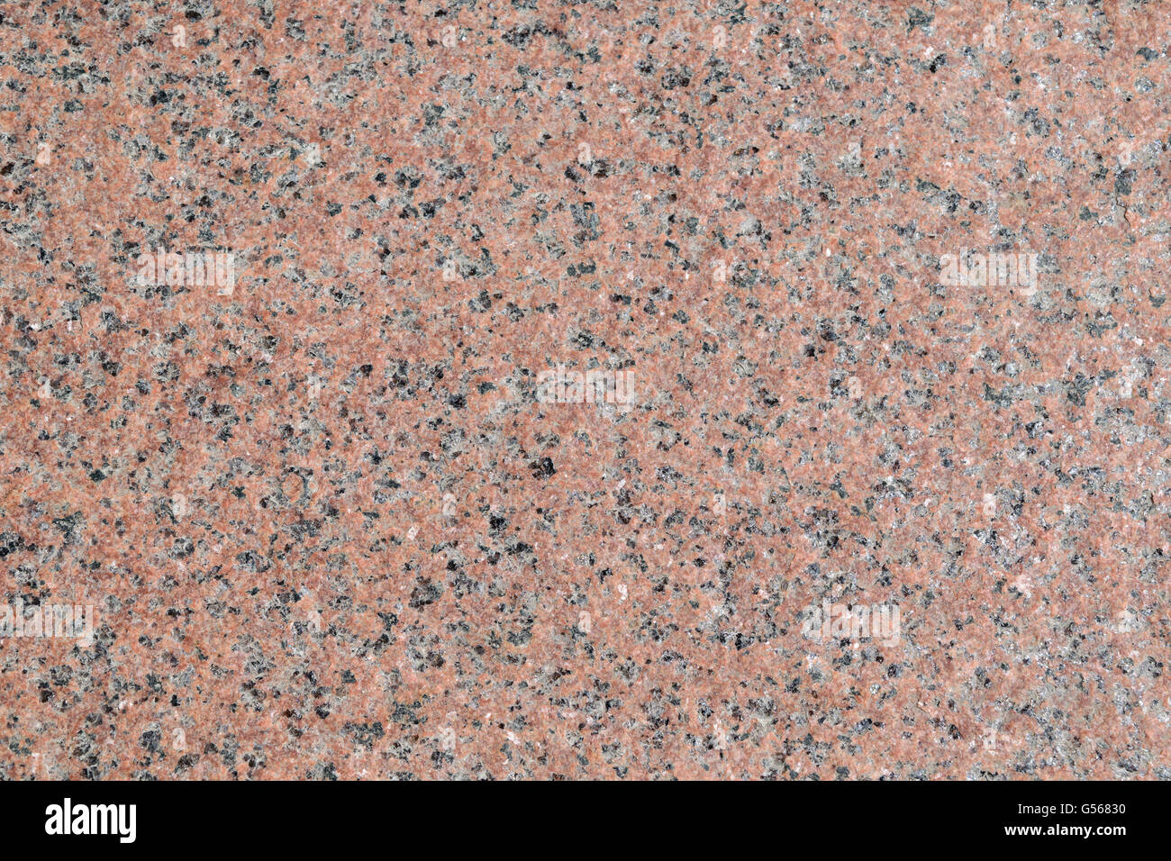 Surface de la lumière avec des murs de granit rose, gris et marron avec des taches blanches. Banque D'Images