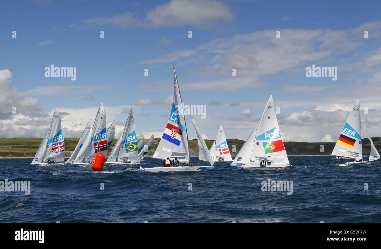 Les marins participent à la voile de l'étoile masculine le deuxième jour des Jeux Olympiques de Londres 2012. Banque D'Images