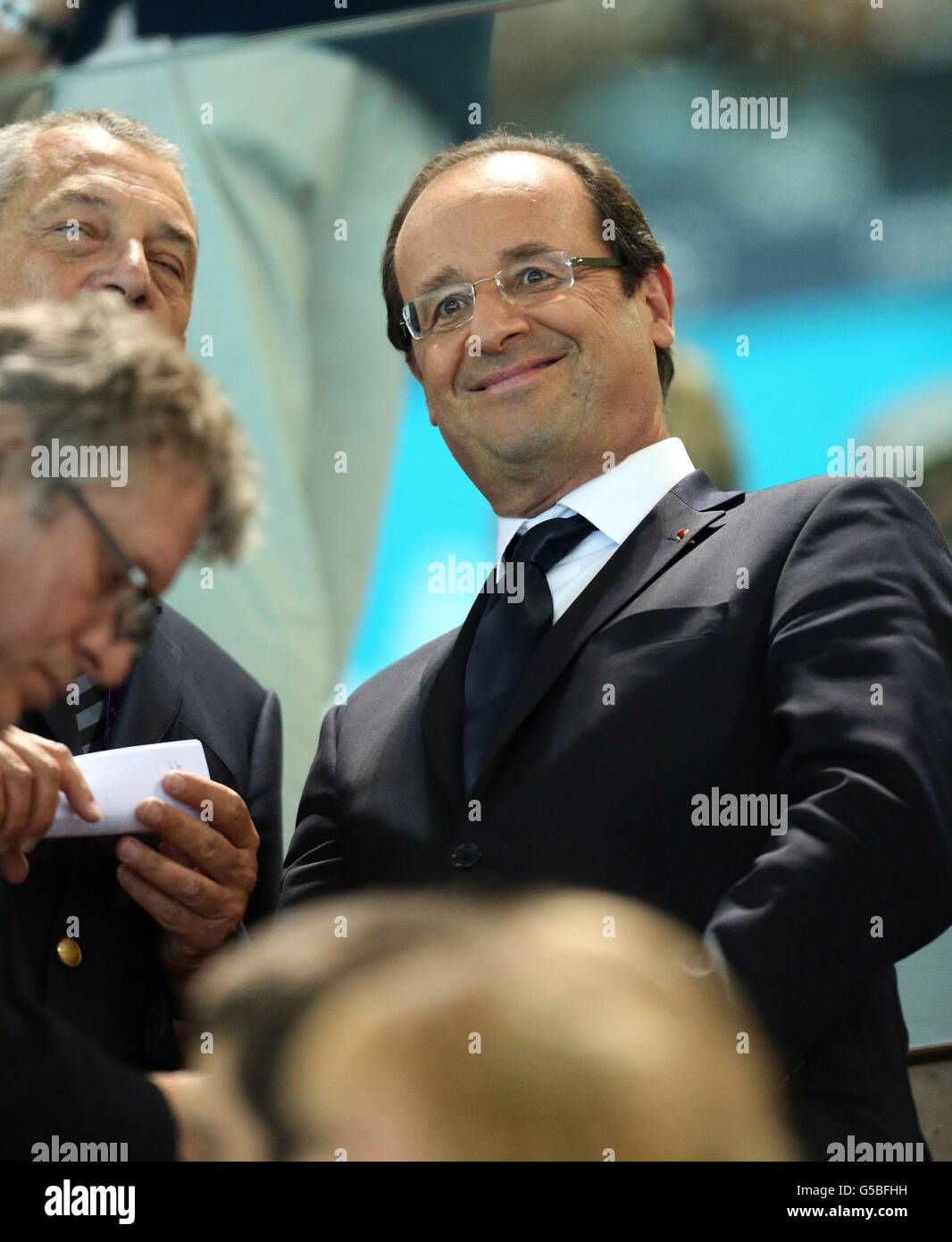 Le président français François Hollande participe à la natation au Centre aquatique du Parc Olympique de Londres, le troisième jour des Jeux Olympiques de Londres 2012. Banque D'Images