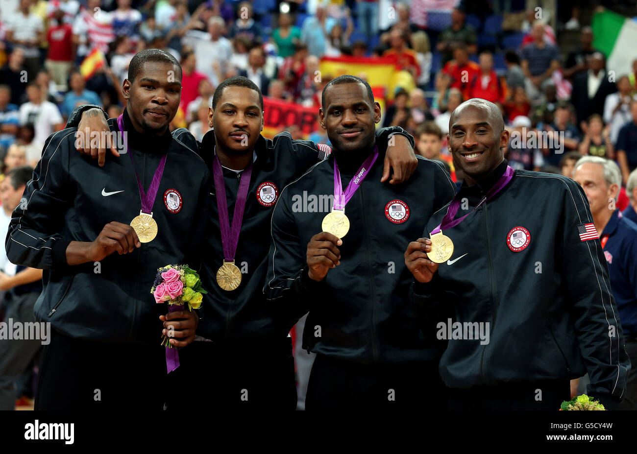 Usa Olympic Men S Basketball Team Member Lamar Odom Goes Up For A Shot Around Puerto Rico National Team Member Sjarif Fajardo During A Scrimmage Game In Jacksonville Usa Olympic Men S Basketball Team