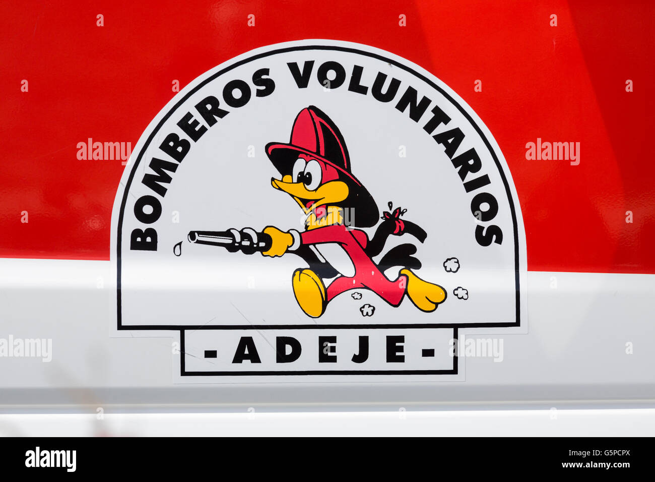 Le logo, symbole de la direction générale de Adeje Tenerifes pompiers volontaires sur le côté d'un camion à incendie, Adeje, Tenerife, Canaries, Espagne Banque D'Images