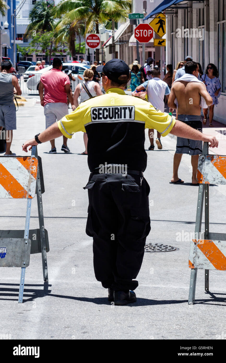 Miami Beach Florida,agent de sécurité,adulte,adultes,homme hommes,travailleurs au travail,personnel employé,barricade,FL160530087 Banque D'Images