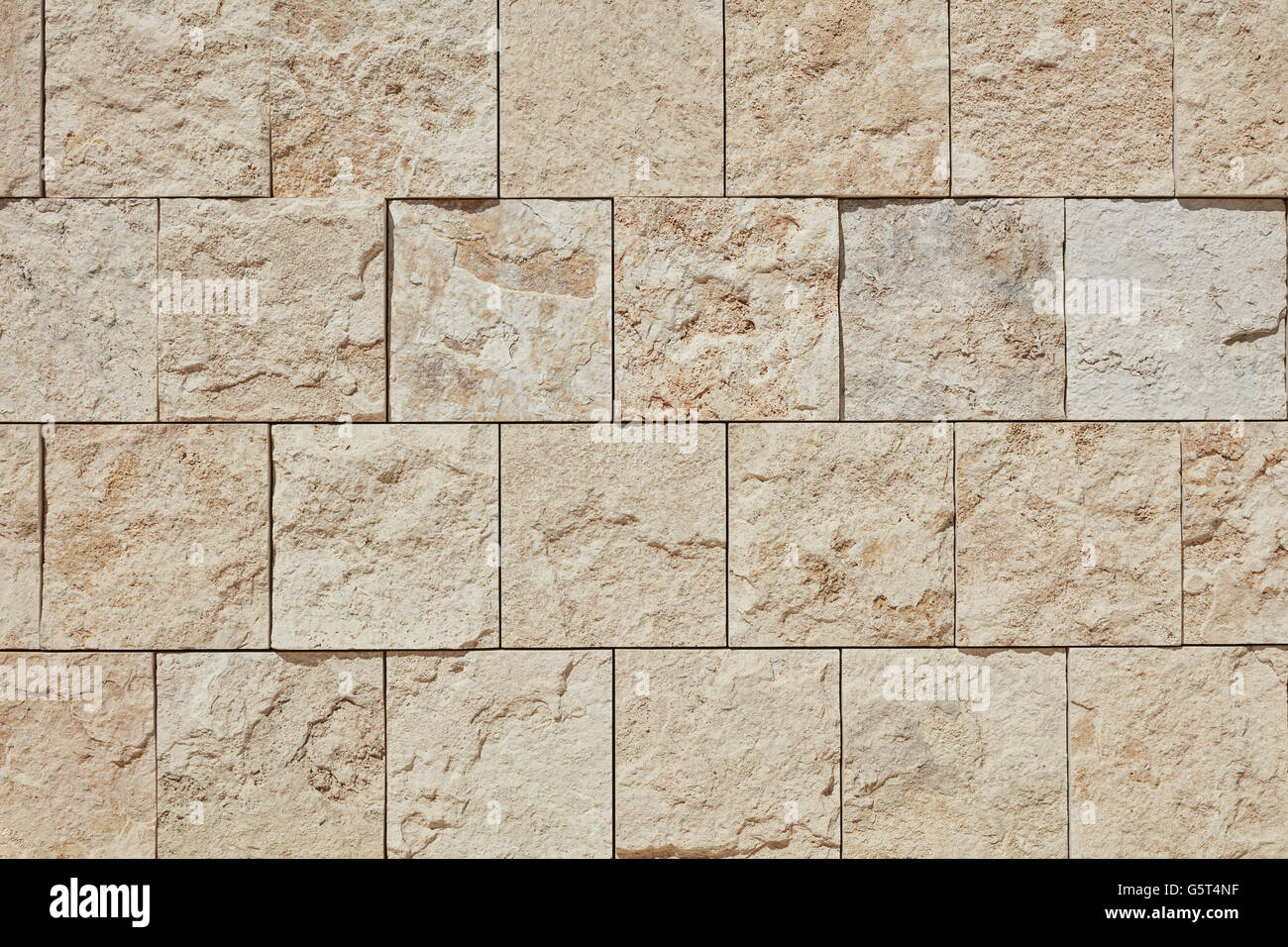 La texture du mur en arrière-plan avec beaucoup de pierres Banque D'Images