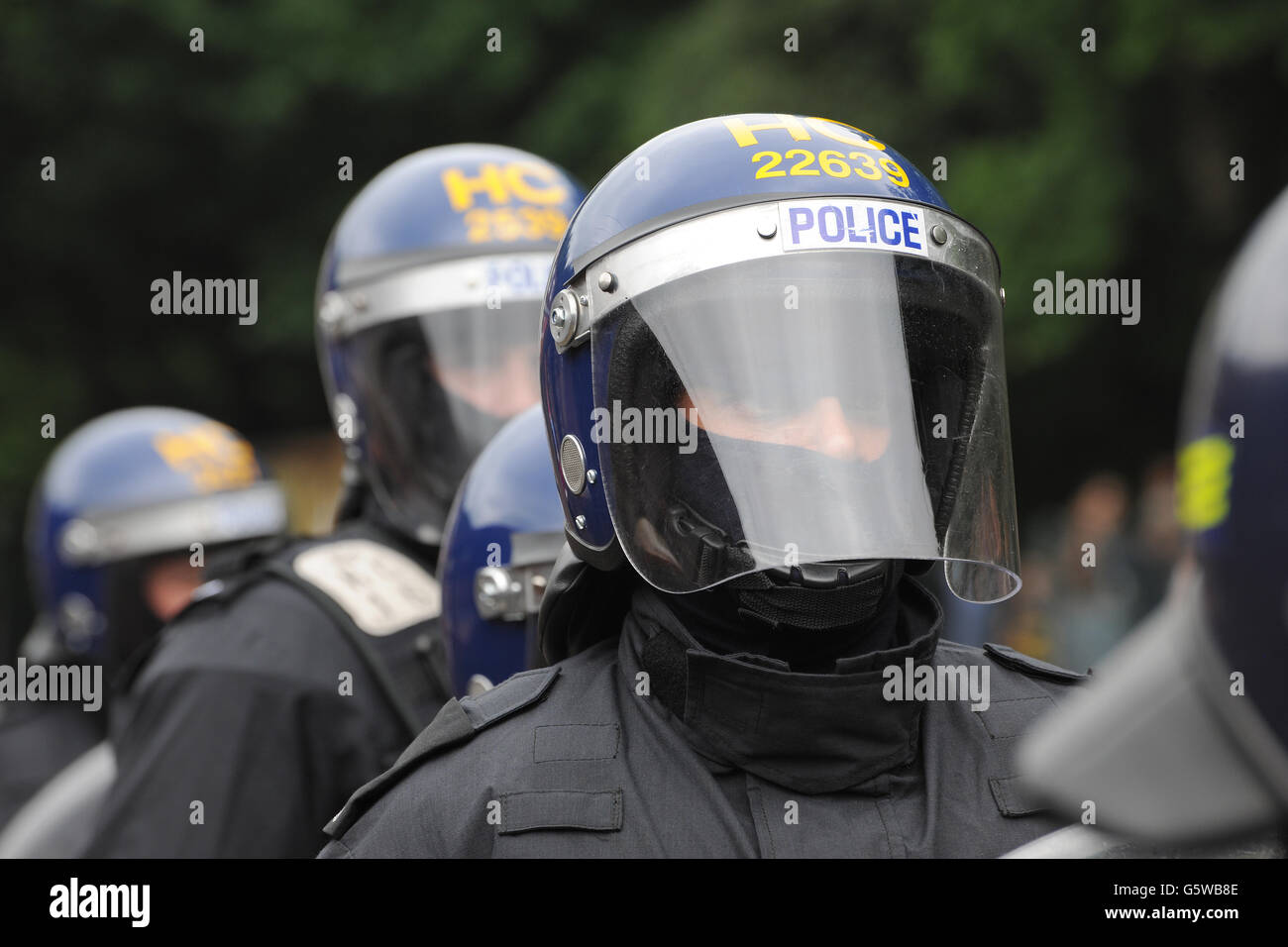 Les agents de l'ordre public police riot tactics Banque D'Images