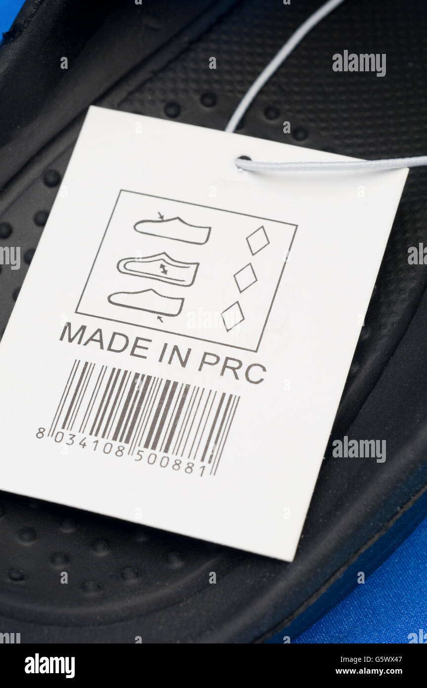 Faites en république populaire de Chine (tag) sur les chaussures de caoutchouc Banque D'Images