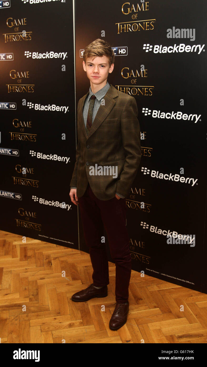 Thomas Brodie Sangster lors d'une projection du premier épisode de la série 3 de Game of Thrones, à Londres. Banque D'Images