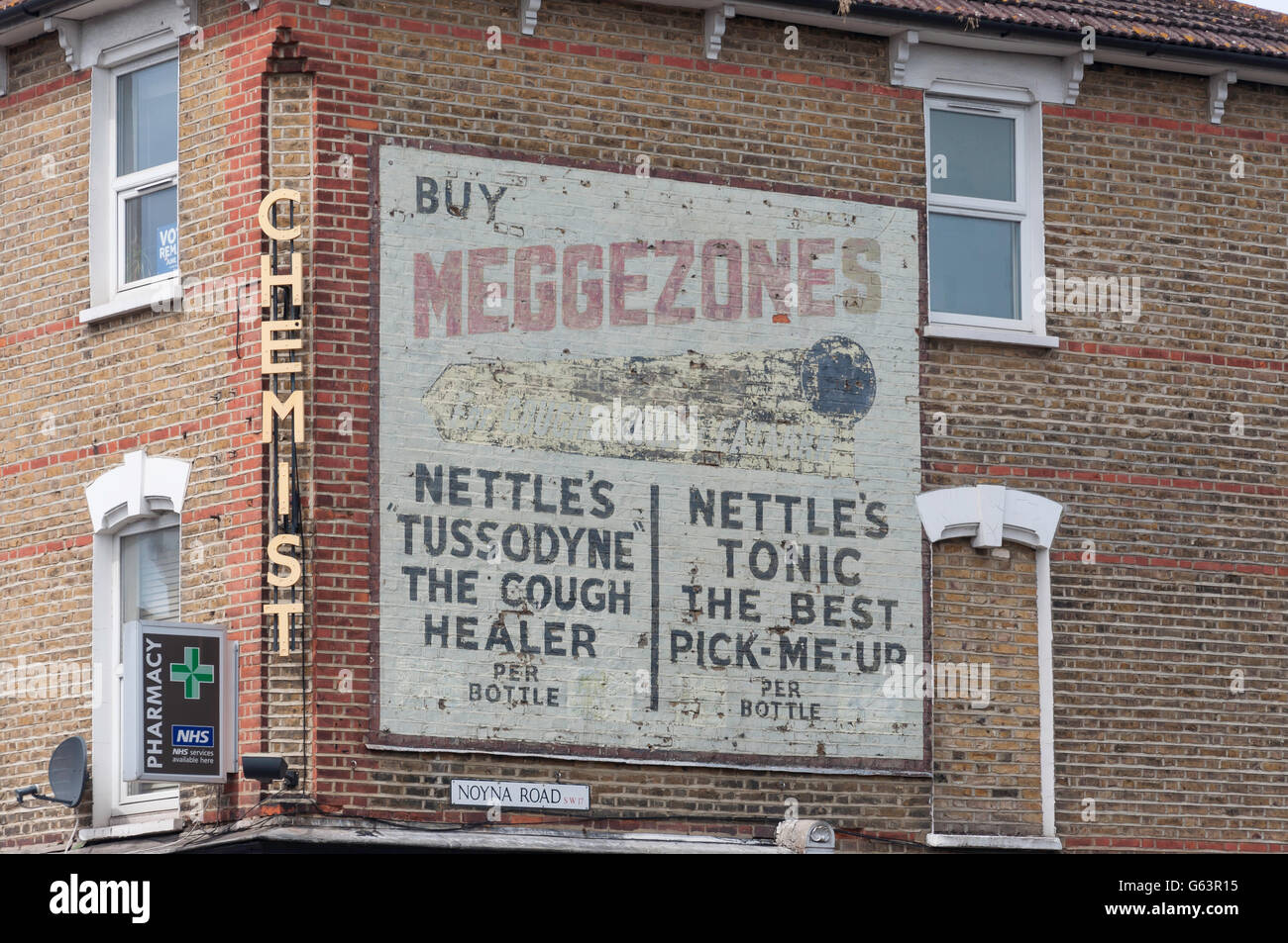 Ancienne enseigne publicitaire sur le mur, Noyna Road, Tooting Bec, Département de Wandsworth, Greater London, Angleterre, Royaume-Uni Banque D'Images