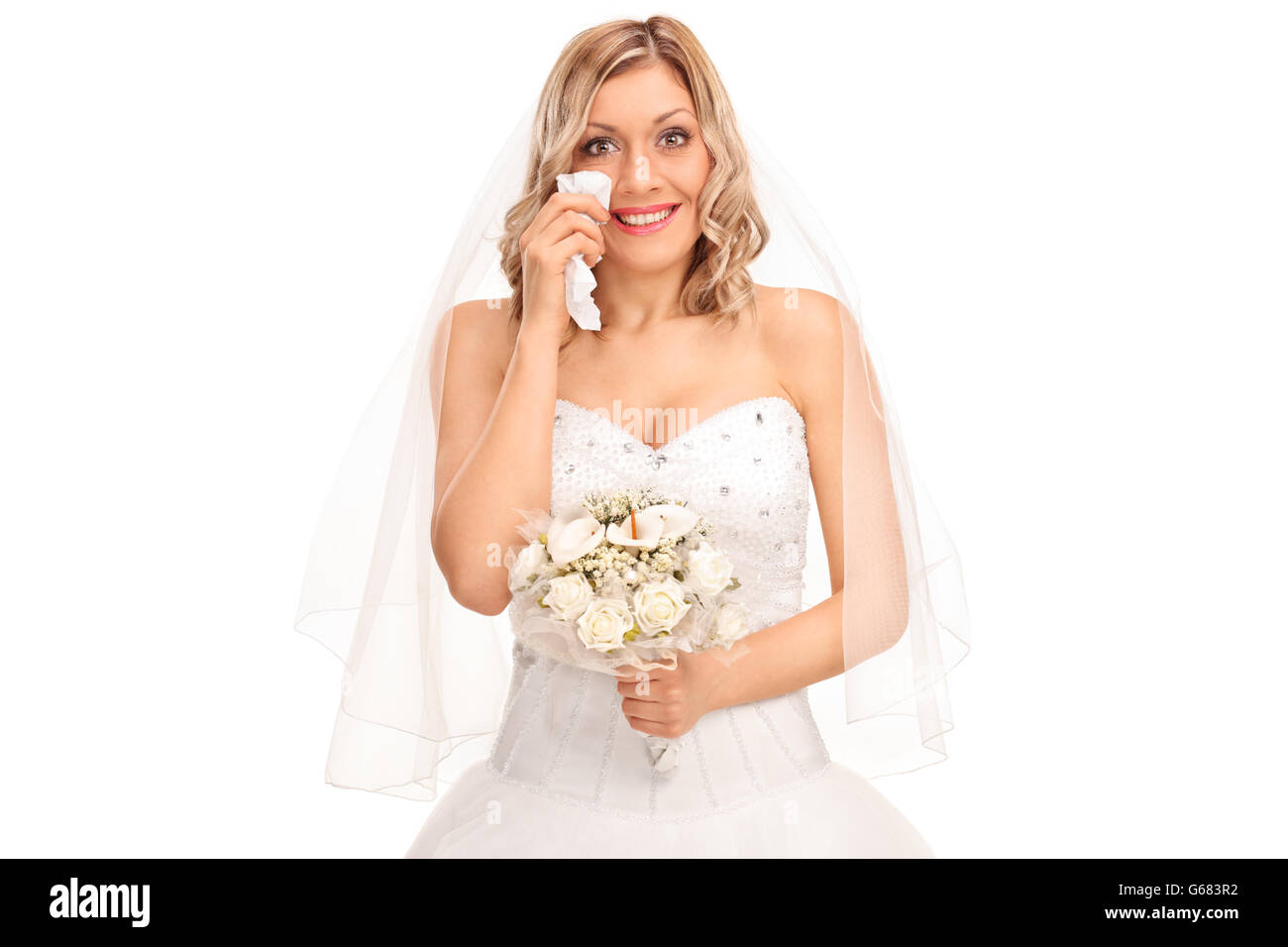 Jeune blonde bride en criant de joie et regardant la caméra isolé sur fond blanc Banque D'Images
