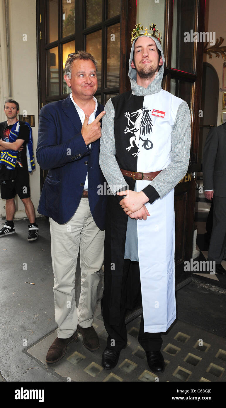 Hugh Bonneville réduite dans Spamalot - Londres Banque D'Images
