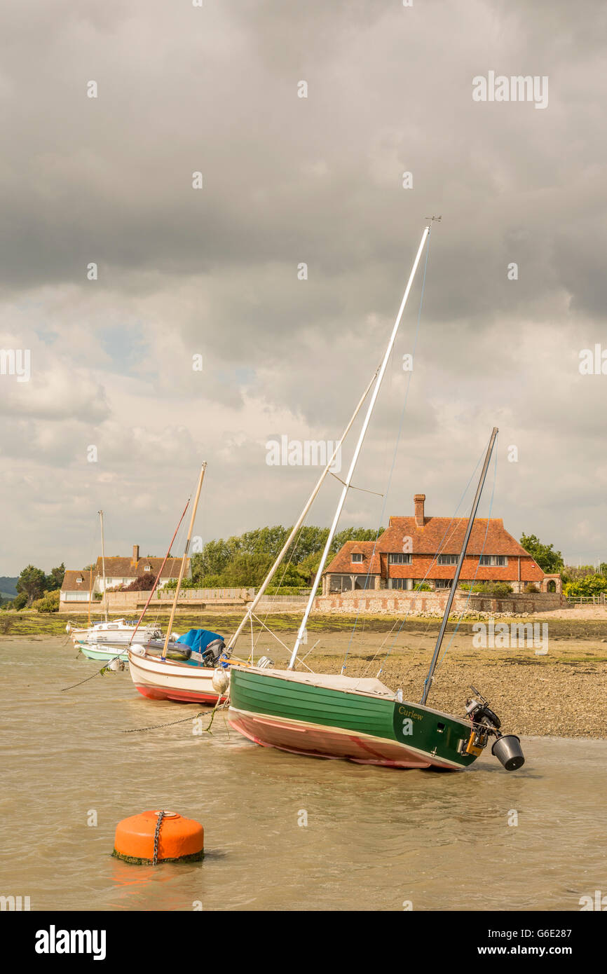 À côté du canal Bosham Quay pré, Bosham, West Sussex, Angleterre, Royaume-Uni. Banque D'Images