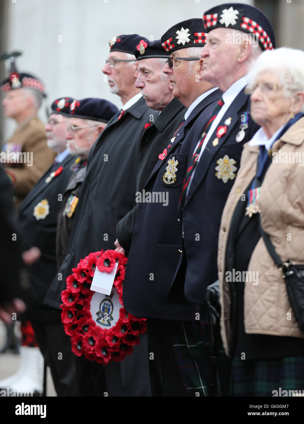 Les anciens combattants de la guerre pendant le service de dévouement au jardin du souvenir de George Square, à Glasgow, en vue des événements annuels du jour du souvenir de Glasgow et du jour de l'armistice à George Square ce week-end. Banque D'Images