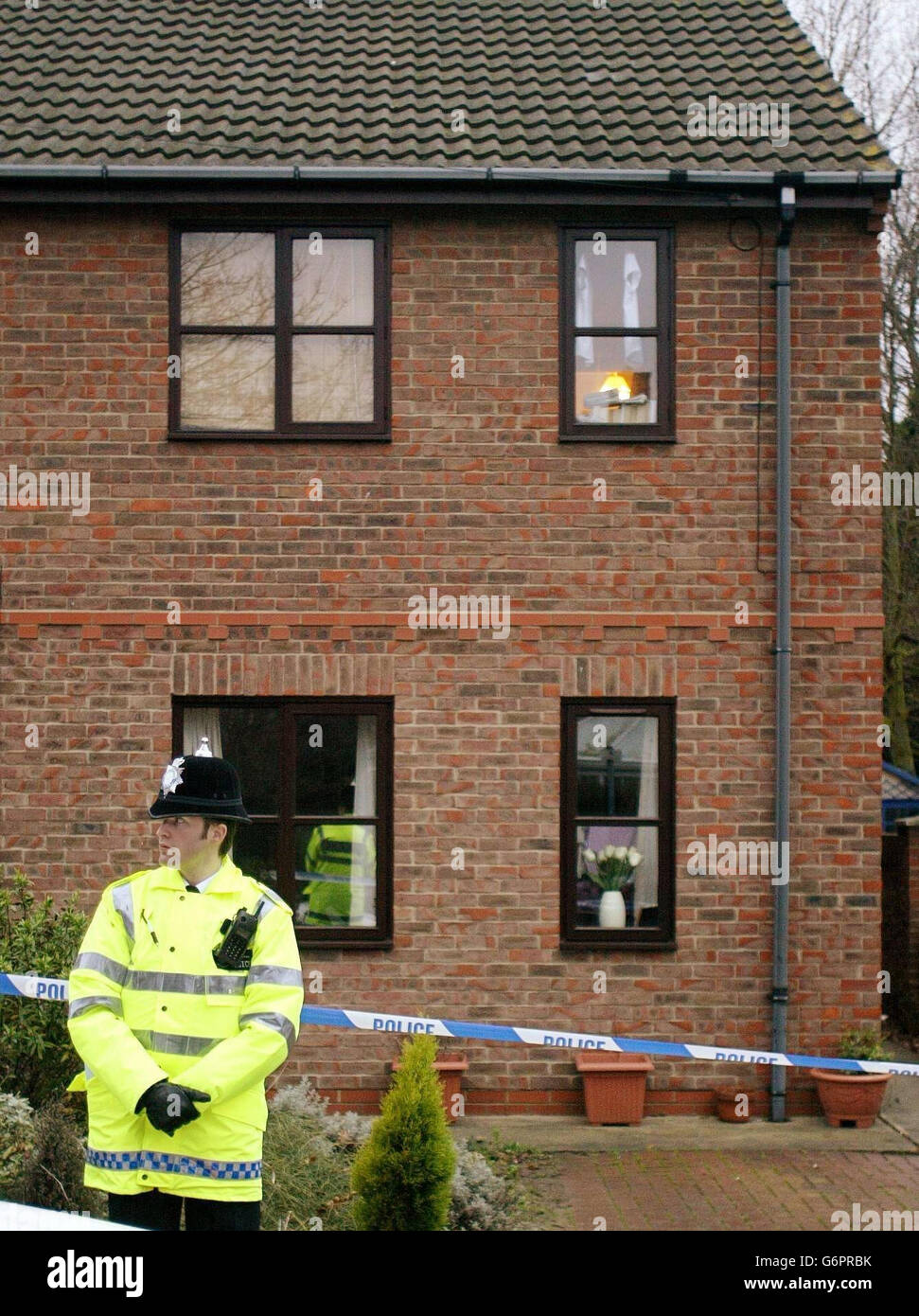 La garde de la police d'une maison à Webster Mews Banque D'Images