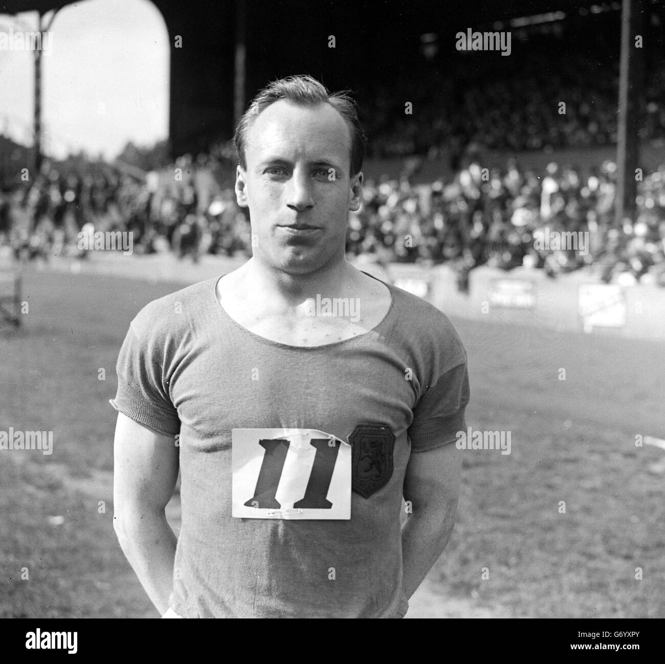 Eric Liddell, Missionnaire écossais qui a gagné l'Or aux 400 mètres aux Jeux Olympiques de Paris en 1924. Son histoire a été rendue célèbre par le film, 'Chariots of Fire'. Après avoir quitté l'athlétisme, il est devenu un missionnaire chrétien en Chine, jusqu'à ce qu'il soit capturé par les Japonais. Il meurt dans un camp de prisonniers de guerre en 1945. Banque D'Images