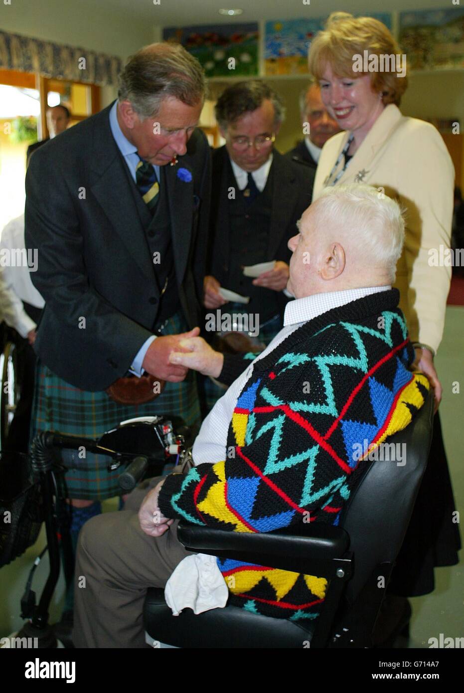 USAGE À L'ÉTRANGER SEULEMENT; le Prince de Galles rencontre l'ancien