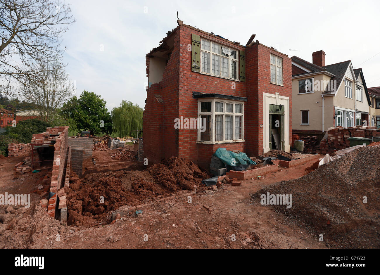 Maison appartenant à la fille de Cllr Allah Ditta dans la région de Battenhall de la ville de Worcester, le conseil a menacé de démolir la propriété 'eyesore' appartenant à la fille du conseiller après que les travaux de rénovation l'ont laissé dans un état dangereux. Banque D'Images