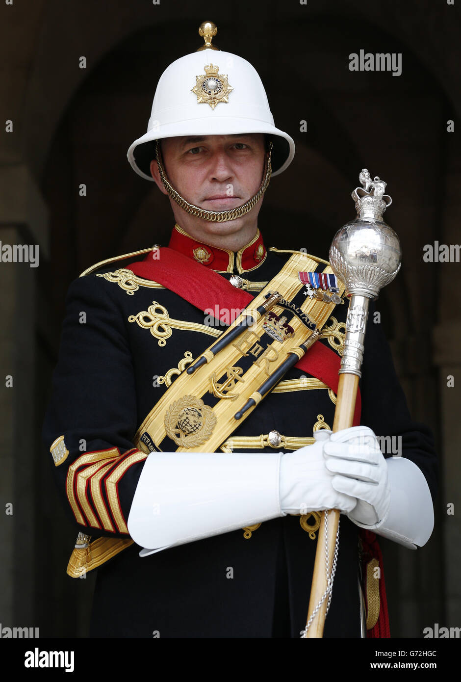 Royal Marines corps Drum Major James 'Wiggy' Whitwham MBE assiste à un appel photo pour faire connaître la prochaine retraite de coups qui aura lieu à Horse Guards Parade, Londres. Banque D'Images