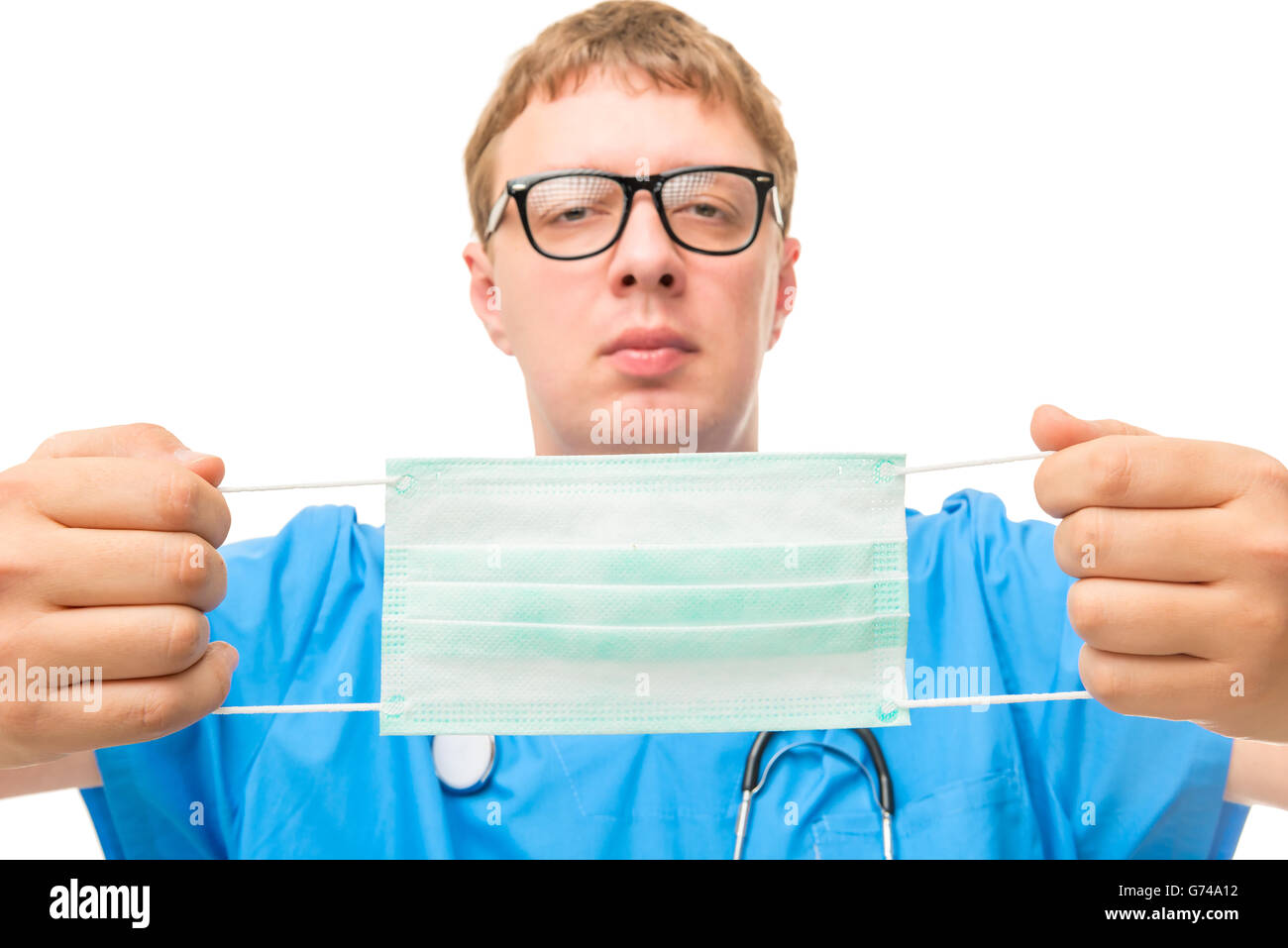 Médecin des mains avec masque close-up se concentrer sur un fond blanc Banque D'Images