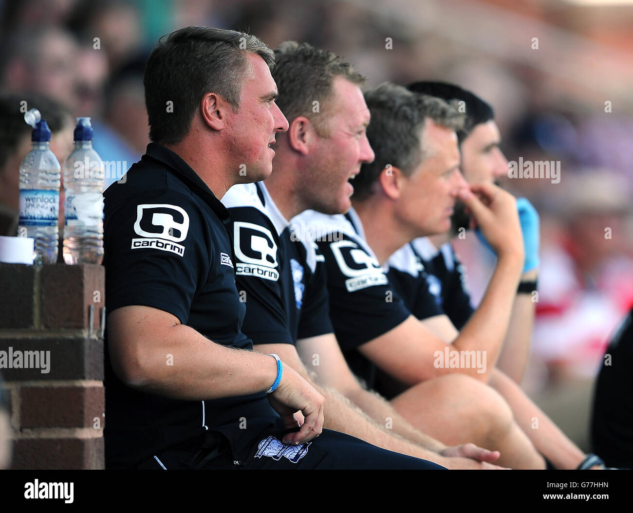 De gauche à droite : Lee Clark, directeur de la ville de Birmingham, Steve Watson, directeur adjoint, Richard Beale, premier entraîneur d'équipe et physio Pete Shaw Banque D'Images