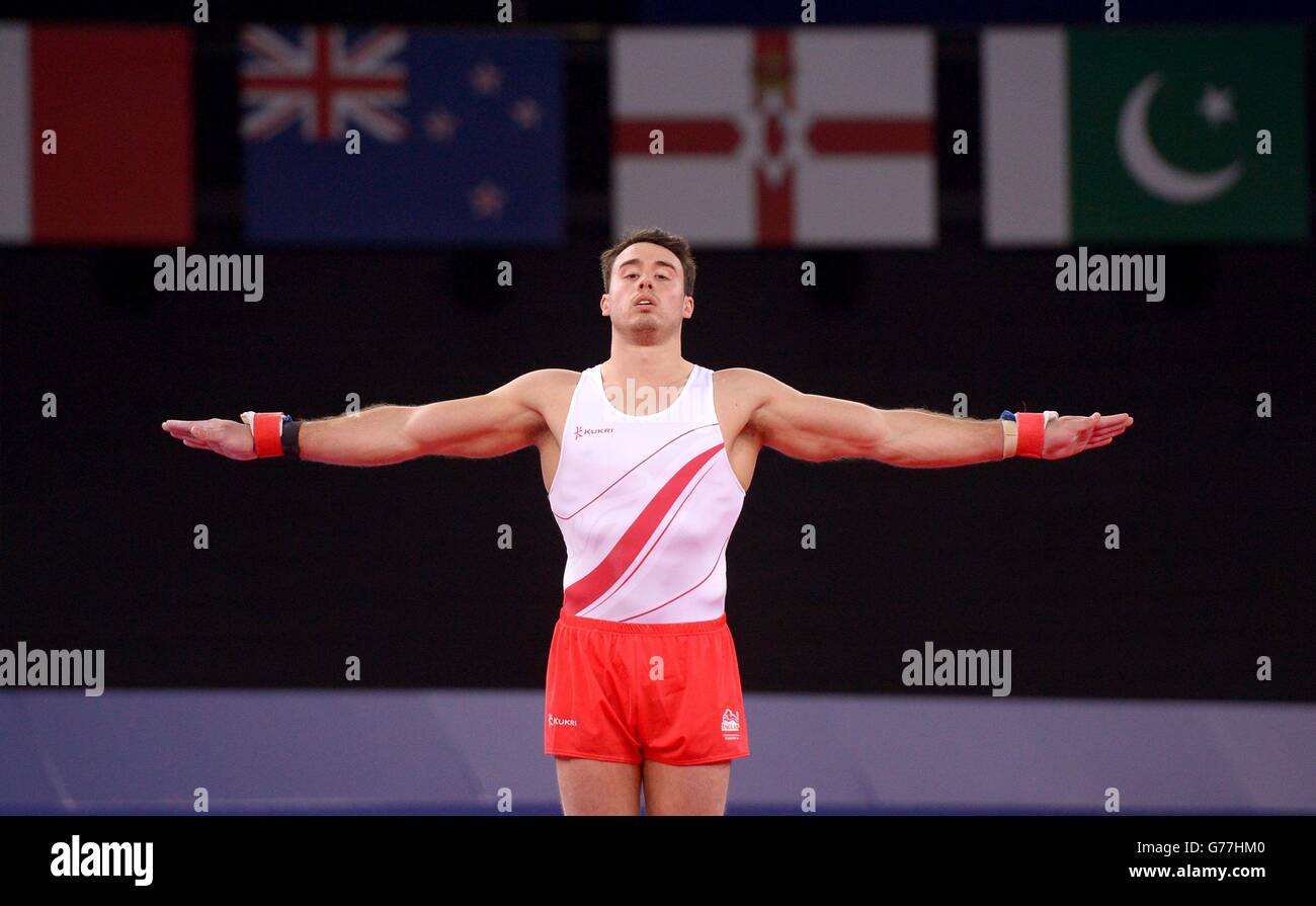 Kristian Thomas d'Angleterre est en compétition sur le sol pendant la finale de l'équipe masculine et la qualification individuelle à la SEE Hydro, pendant les Jeux du Commonwealth de 2014 à Glasgow. Banque D'Images