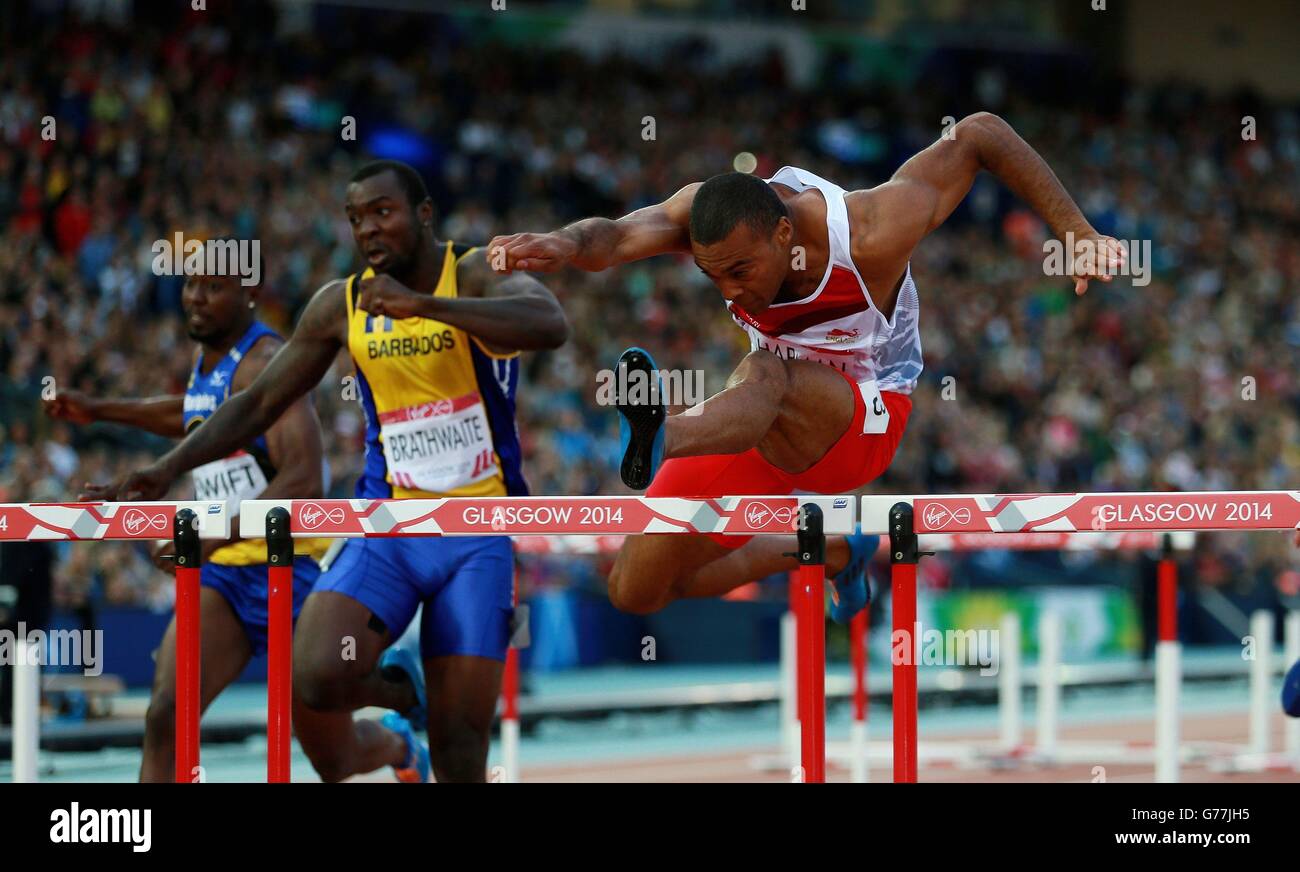 William Sharman d'Angleterre sur le chemin de gagner l'argent dans les hommes de 110 m haies à Hampden Park, pendant les Jeux du Commonwealth 2014 à Glasgow. Banque D'Images