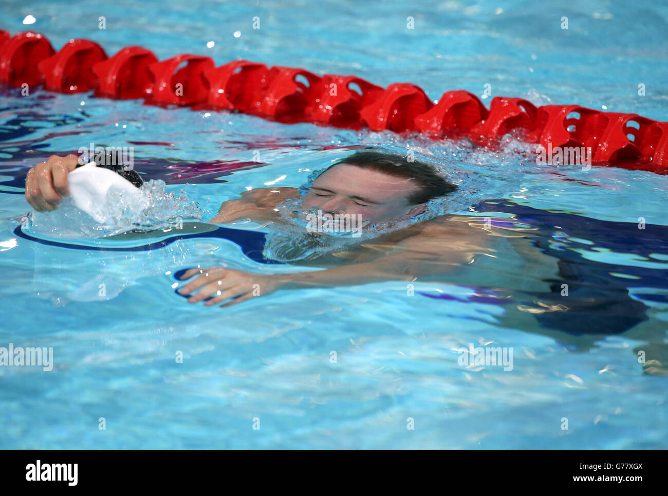 Robbie Renwick, en Écosse, après avoir terminé deuxième dans la Freestyle Heat 5 de 200 m masculin au Tollcross International Swimming Centre pendant les Jeux du Commonwealth de 2014 à Glasgow. Banque D'Images